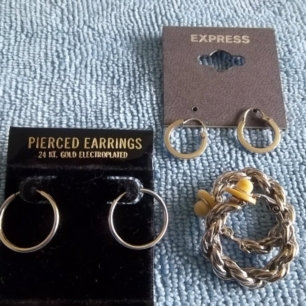 Three pairs of small hoop earrings